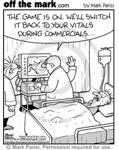 Doctors switch between game and patient's vitals on monitor.