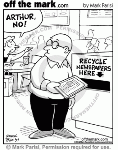 An old man tries to recycle his iPad in a newspaper recycling bin.