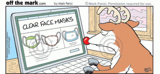 Rudolph the red nosed reindeer on laptop shops online for clear face masks PPE for pandemic Christmas.